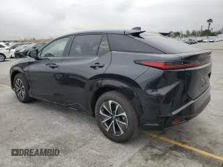 2024 Lexus RZ 450e Premium z VIN JTJAAAABXRA026441, wystawiony jako Copart lot #56064095 z przebiegiem 422 mil mil oraz Szkody całkowita. Historia ofert i sprzedaży dostępna na DreamBid. Obrazek 2.