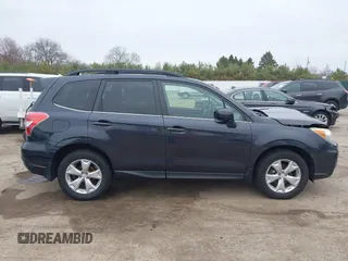 2014 Subaru Forester 2.5i Limited with VIN JF2SJAJC1EH517094, listed as a IAAI auction lot 41953103 with 145,122 mi miles. Bid and sale history available at carsss.com. Image 14.