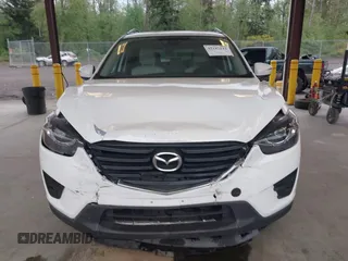 2016 Mazda CX-5 Grand Touring with VIN JM3KE2DYXG0675619, listed as a IAAI auction lot 42137144 with 106,262 mi miles and . Bid and sale history available at DreamBid. Image 12.