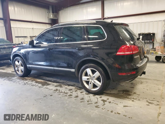 2011 Volkswagen Touareg Exec with VIN WVGFK9BP8BD003948, listed as a Copart auction lot 48285065 with 152,497 mi miles and Salvage Title. Bid and sale history available at DreamBid. Image 2.