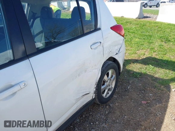 2012 Nissan Versa S with VIN 3N1BC1CPXCK212600, listed as a IAAI auction lot 41918424 with 104,483 mi miles. Bid and sale history available at carsss.com. Image 6.