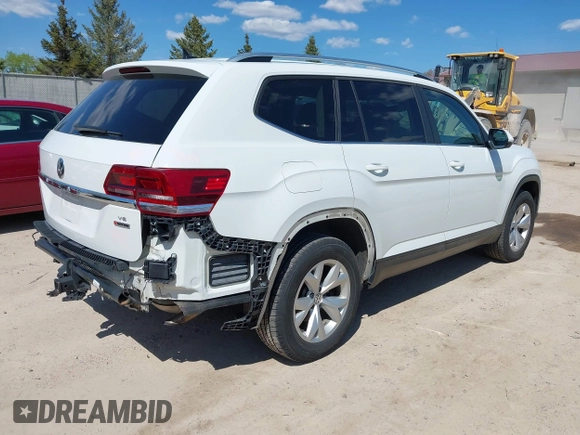 2018 Volkswagen Atlas SE with VIN 1V2KR2CAXJC586848, listed as a IAAI auction lot 42200959 with 96,336 mi miles and . Bid and sale history available at DreamBid. Image 4.