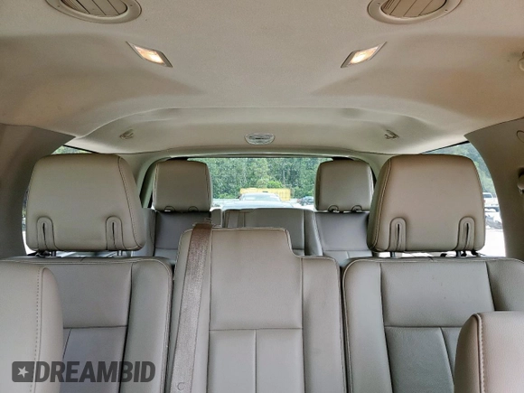 2014 Ford Expedition XLT with VIN 1FMJU1H54EEF41878, listed as a Copart auction lot 59671515 with 95,082 mi miles and Salvage title. Bid and sale history available at DreamBid. Image 10.