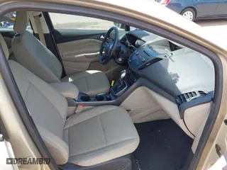 2018 Ford C-Max Hybrid SE with VIN 1FADP5AU7JL105118, listed as a IAAI auction lot 42085019 with 71,019 mi miles. Bid and sale history available at carsss.com. Image 5.