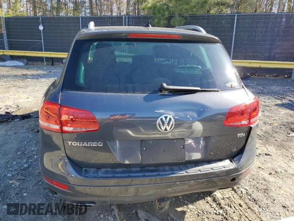 2012 Volkswagen Touareg Lux с VIN WVGEK9BP1CD008132, выставлен на аукционе Copart как лот 49501765 с пробегом 156 594 миль миль и Списание • Salvage title. История ставок и продаж доступна на DreamBid. Изображение 6.