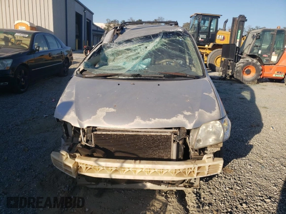 2003 Mazda MPV LX with VIN JM3LW28A930352557, listed as a Copart auction lot 77482554 with Not Provided miles and Salvage Title. Bid and sale history available at carsss.com. Image 5.