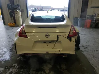 2016 Nissan 370Z Nismo с VIN JN1AZ4EH7GM930385, выставлен на аукционе Copart как лот 48208185 с пробегом 66 972 миль миль и Списание • Salvage title. История ставок и продаж доступна на DreamBid. Изображение 6.