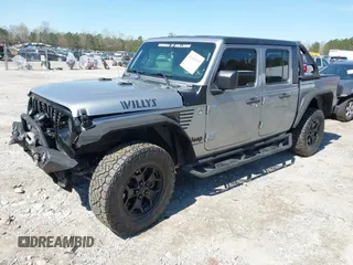 2021 Jeep Gladiator Freedom with VIN 1C6HJTAG3ML540967, listed as a IAAI auction lot 41883858 with 92,287 mi miles and . Bid and sale history available at DreamBid. Image 2.