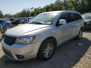 2013 Dodge Journey SXT with VIN 3C4PDCBGXDT717240, listed as a Copart auction lot 52579265 with 176,121 mi miles and Clean Title. Bid and sale history available at carsss.com. Image 1.