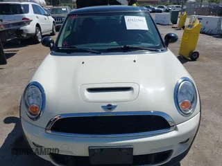 2011 MINI Hardtop S with VIN WMWSV3C50BTY23450, listed as a IAAI auction lot 42121502 with 239,025 mi miles and . Bid and sale history available at DreamBid. Image 6.