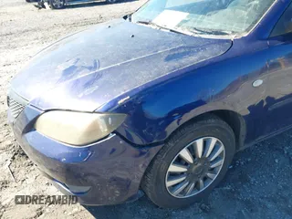 2006 Mazda 3 i Touring with VIN JM1BK32F561494865, listed as a IAAI auction lot 41637307 with 157,317 mi miles and . Bid and sale history available at DreamBid. Image 6.