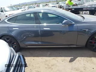 2018 Tesla Model S 75D with VIN 5YJSA1E43JF260547, listed as a IAAI auction lot 42346240 with 89,637 mi miles and . Bid and sale history available at DreamBid. Image 12.