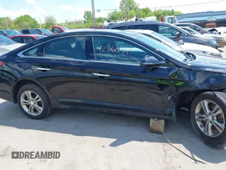 2019 Hyundai Sonata Sport z VIN 5NPE34AF1KH797081, wystawiony jako IAAI lot #42260397 z przebiegiem 72 348 mil mil oraz . Historia ofert i sprzedaży dostępna na DreamBid. Obrazek 13.