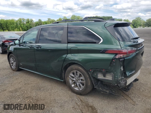 2021 Toyota Sienna LE with VIN 5TDBSKFC4MS027897, listed as a Copart auction lot 56052375 with 66,604 mi miles and Salvage title. Bid and sale history available at DreamBid. Image 2.