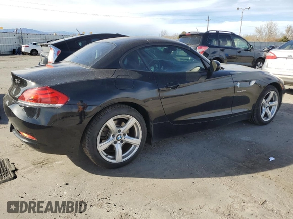 2013 BMW Z4 sDrive28i with VIN WBALL5C50DJ103778, listed as a Copart auction lot 49452215 with 104,203 mi miles and Salvage Title. Bid and sale history available at carsss.com. Image 3.