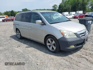 2006 Honda Odyssey Touring z VIN 5FNRL38816B012601, wystawiony jako IAAI lot #42148571 z przebiegiem 278 590 mil mil oraz . Historia ofert i sprzedaży dostępna na DreamBid. Obrazek 1.