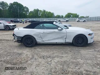 2020 Ford Mustang EcoBoost with VIN 1FATP8UH2L5119009, listed as a IAAI auction lot 42251261 with 80,725 mi miles and . Bid and sale history available at DreamBid. Image 14.