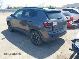 2021 Jeep Compass Trailhawk with VIN 3C4NJDDB8MT529176, listed as a IAAI auction lot 41984762 with 122,412 mi miles and . Bid and sale history available at DreamBid. Image 3.