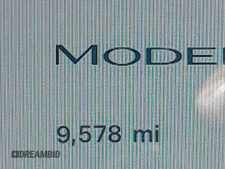2023 Tesla Model 3 with VIN 5YJ3E1EA3PF617460, listed as a IAAI auction lot 42154401 with 9,578 mi miles and . Bid and sale history available at DreamBid. Image 14.