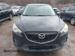 2014 Mazda CX-5 Grand Touring with VIN JM3KE4DY5E0373731, listed as a IAAI auction lot 41517852 with 148,414 mi miles. Bid and sale history available at carsss.com. Image 6.