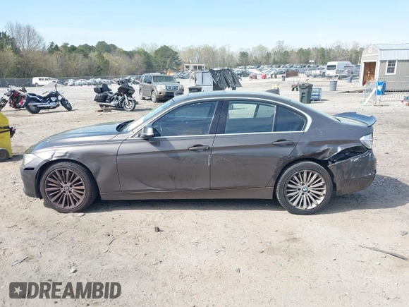 2013 BMW 3 Series 335i with VIN WBA3A9C51DF476537, listed as a IAAI auction lot 41900742 with 184,094 mi miles and . Bid and sale history available at DreamBid. Image 14.