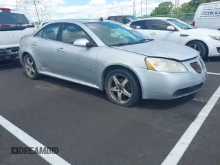 2009 Pontiac G6 GXP 1SA with VIN 1G2ZM577594217405, listed as a IAAI auction lot 42394668 with 232,180 mi miles and . Bid and sale history available at DreamBid. Image 1.