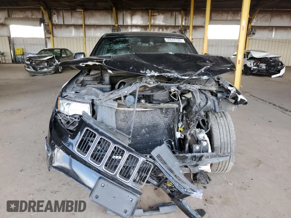 2015 Jeep Grand Cherokee Limited with VIN 1C4RJEBG7FC217855, listed as a Copart auction lot 50642135 with 124,130 mi miles and Salvage Title. Bid and sale history available at carsss.com. Image 5.