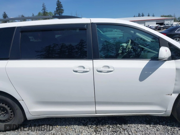 2013 Toyota Sienna XLE AAS with VIN 5TDYK3DC9DS292737, listed as a IAAI auction lot 42160582 with 200,321 mi miles and . Bid and sale history available at DreamBid. Image 14.