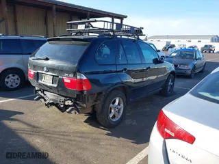 2005 BMW X5 3.0i with VIN 5UXFA13585LY10856, listed as a IAAI auction lot 41745279 with 153,748 mi miles. Bid and sale history available at carsss.com. Image 4.