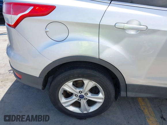 2016 Ford Escape SE with VIN 1FMCU0GX7GUB72822, listed as a IAAI auction lot 42136764 with 98,497 mi miles. Bid and sale history available at carsss.com. Image 6.