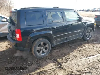 2014 Jeep Patriot High Altitude with VIN 1C4NJPFAXED888929, listed as a IAAI auction lot 41474736 with 117,697 mi miles and . Bid and sale history available at carsss.com. Image 4.