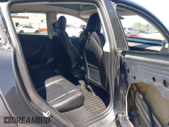2021 Tesla Model Y Long Range with VIN 5YJYGDEE4MF119249, listed as a IAAI auction lot 41764711 with 87,796 mi miles. Bid and sale history available at carsss.com. Image 8.