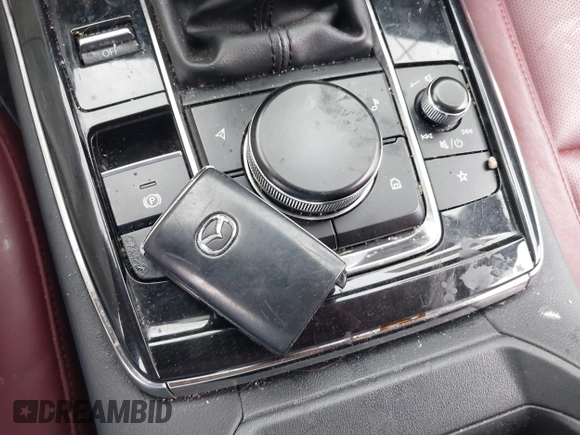 2023 Mazda CX-30 S Carbon Edition with VIN 3MVDMBCM0PM532449, listed as a IAAI auction lot 41799255 with 60,604 mi miles and . Bid and sale history available at DreamBid. Image 11.