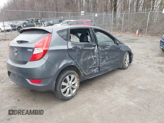 2013 Hyundai Accent SE with VIN KMHCU5AE1DU091931, listed as a IAAI auction lot 41783034 with 72,732 mi miles. Bid and sale history available at carsss.com. Image 4.