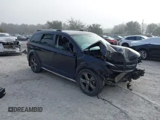 2015 Dodge Journey Crossroad with VIN 3C4PDCGB2FT564739, listed as a IAAI auction lot 41489950 with 112,536 mi miles and . Bid and sale history available at DreamBid. Image 1.
