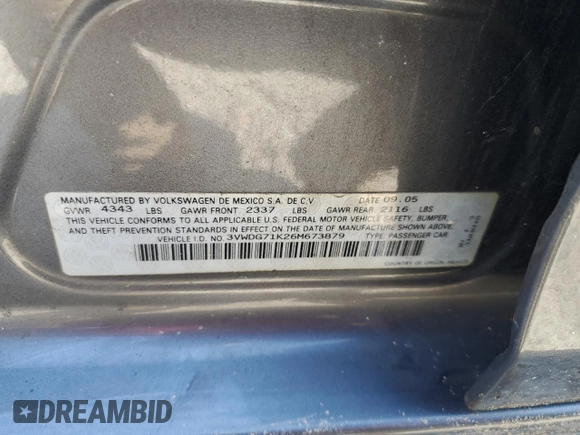 2006 Volkswagen Jetta z VIN 3VWDG71K26M673879, wystawiony jako Copart lot #75674634 z przebiegiem 93 689 mil mil oraz Szkoda całkowita • Salvage title. Historia ofert i sprzedaży dostępna na DreamBid. Obrazek 13.