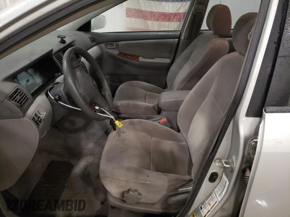 2004 Toyota Corolla CE with VIN 1NXBR38E94Z341018, listed as a Copart auction lot 82170594 with 221,462 mi miles and Non Repairable. Bid and sale history available at DreamBid. Image 7.