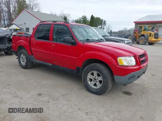 2005 Ford Explorer Sport Trac XLS z VIN 1FMZU77K85UB13850, wystawiony jako IAAI lot #42102672 z przebiegiem Nie podano mil oraz . Historia ofert i sprzedaży dostępna na DreamBid. Obrazek 1.