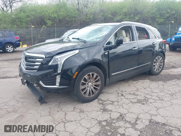 2017 Cadillac XT5 Luxury AWD with VIN 1GYKNDRS7HZ157936, listed as a IAAI auction lot 41971116 with 134,351 mi miles and . Bid and sale history available at DreamBid. Image 2.