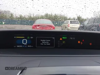 2021 Toyota Prius LE with VIN JTDKAMFP9M3170928, listed as a IAAI auction lot 42123934 with 58,293 mi miles and . Bid and sale history available at DreamBid. Image 7.