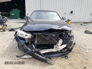 2016 BMW 4 Series 428i with VIN WBA3N7C52GK228544, listed as a Copart auction lot 53991705 with 103,218 mi miles and Salvage title. Bid and sale history available at DreamBid. Image 5.