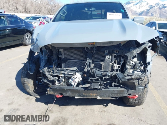 2023 Nissan Frontier SV with VIN 1N6ED1EK2PN633278, listed as a IAAI auction lot 41854671 with 59,549 mi miles and . Bid and sale history available at DreamBid. Image 6.