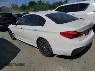 2018 BMW 5 Series 540i xDrive with VIN WBAJE7C52JG891212, listed as a Copart auction lot 58119195 with 73,770 mi miles and Salvage title. Bid and sale history available at DreamBid. Image 2.