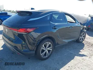 2024 Lexus RX with VIN JTJCHMAA3R2018477, listed as a IAAI auction lot 41738156 with 7,480 mi miles. Bid and sale history available at carsss.com. Image 4.