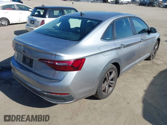 2022 Volkswagen Jetta SE with VIN 3VW7M7BU1NM019993, listed as a IAAI auction lot 42087376 with 74,596 mi miles and . Bid and sale history available at DreamBid. Image 4.