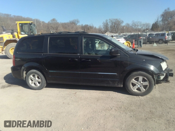 2009 Dodge Grand Caravan SXT z VIN 2D8HN54169R539294, wystawiony jako IAAI lot #41804315 z przebiegiem 175 090 mil mil oraz . Historia ofert i sprzedaży dostępna na DreamBid. Obrazek 13.