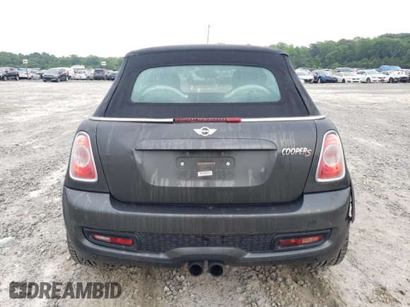 2013 MINI Convertible S с VIN WMWZP3C58DT550592, выставлен на аукционе Copart как лот 56250685 с пробегом 141 821 миль миль и Списание • Salvage title. История ставок и продаж доступна на DreamBid. Изображение 6.