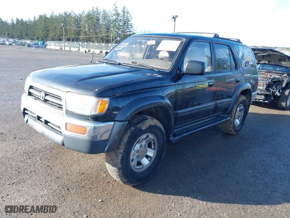 1997 Toyota 4Runner Limited with VIN JT3HN87R1V0079567, listed as a IAAI auction lot 41725597 with 291,662 mi miles. Bid and sale history available at carsss.com. Image 2.