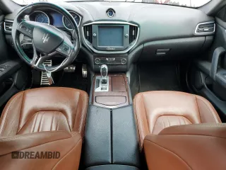 2014 Maserati Ghibli z VIN ZAM57XSA3E1101014, wystawiony jako Copart lot #59591765 z przebiegiem 91 892 mil mil oraz Czysty tytuł • Clean title. Historia ofert i sprzedaży dostępna na DreamBid. Obrazek 8.