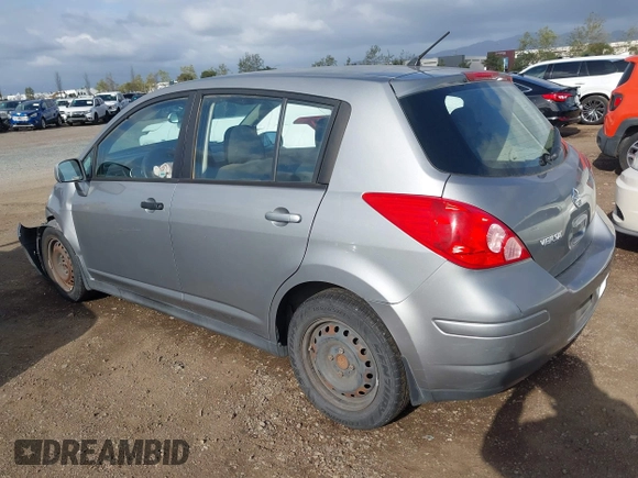2012 Nissan Versa S with VIN 3N1BC1CPXCK229848, listed as a IAAI auction lot 41955230 with 194,702 mi miles. Bid and sale history available at carsss.com. Image 3.